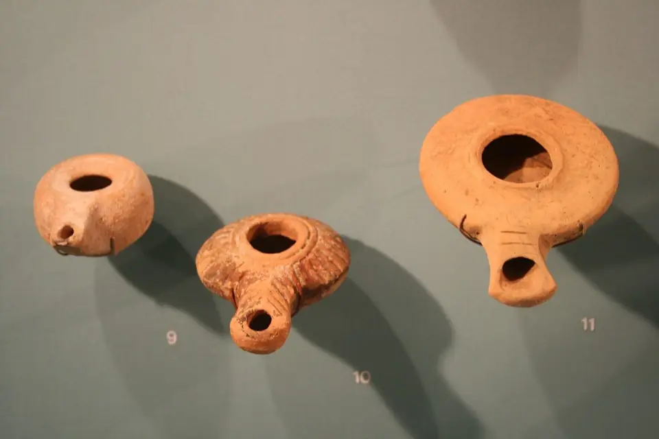 Three ancient clay oil lamps